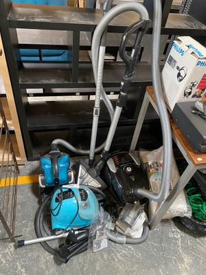 a picture of a vacuum and other tools in a room