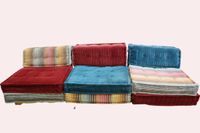 * ROCHE BOBOIS. Canapé modèle « Mah Jong » en tissu coloré.