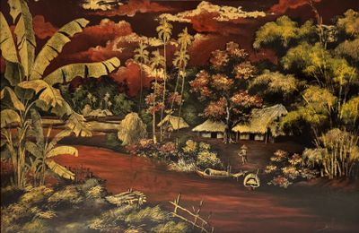 un tableau sur le mur d'une pièce où se trouve un tableau