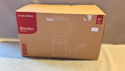 le boîtier d'un mixeur posé sur une table