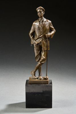 une image représentant une statue en bronze d'un homme muni d'une canne