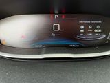 the dashboard of a car with a digital display on it