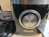 a black and silver blender sitting on a counter