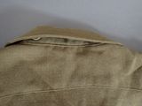 a close up of a man ' s jacket and tie