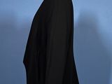 an image of a black jacket on a mannequin stand