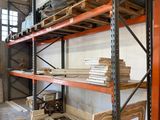 a room that has a lot of shelves and a chair in it
