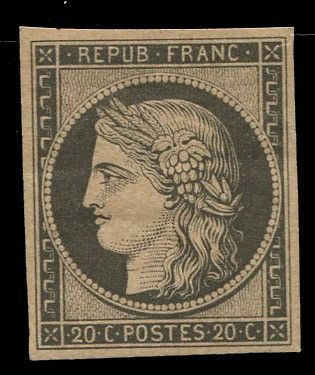 a close up of a stamp with a woman ' s face on it