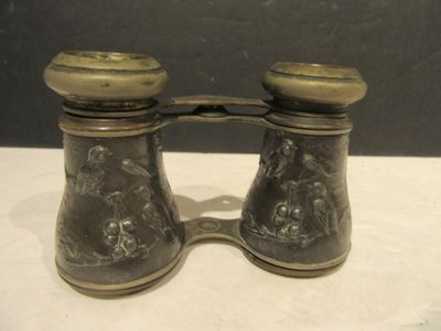 a pair of binoculars that are on a table