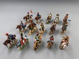 un ensemble de figurines représentant des hommes à cheval tenant des drapeaux