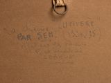 a brown box with writing on it with a key in it