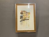 framed watercolor painting of a boat on a canal in venice