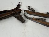 pair of antique wood and metal clamps