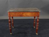 a small table with a marble top and wooden legs