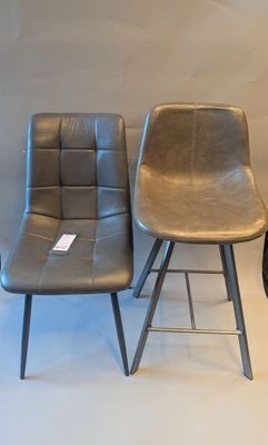 three chairs sitting next to each other in a room