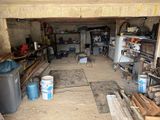 an image of a garage with a lot of tools in it