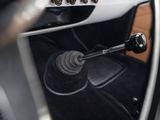 a close up of a car ' s interior with a gear stick