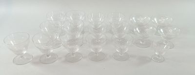 a lot of empty wine glasses sitting on a table