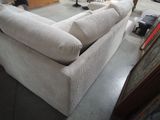 a couch that is sitting in the middle of a room
