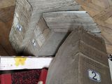 a pile of books sitting on top of a wooden floor
