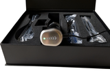 a black box with a silver electronic device inside of it