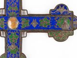 an image of a blue and green cross on a white background