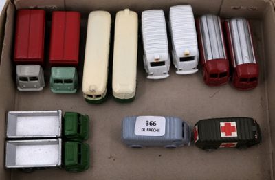 many different types of toy trucks in a box