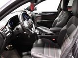 a picture of the inside of a car with the driver ' s seat up