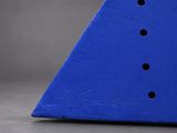 a blue triangle shaped object with holes in it