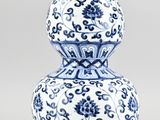 blue and white double gourd vase with floral design