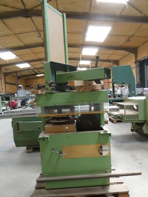 a large machine that is sitting in a warehouse