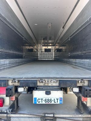 a picture of a flat bed truck with a license plate