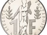 an image of a silver coin with a woman holding a plant