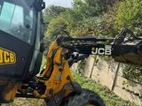 a picture of a backhoe of a jcc loader