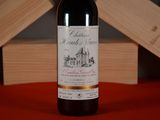 a bottle of wine that is sitting on a table