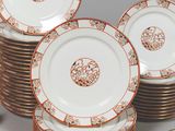 a lot of plates that are sitting on a table