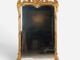 an image of a gold framed mirror on a white background