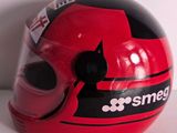 a close up of a helmet on a white surface