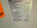 a picture of a sign on the wall of a machine