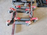 a lot of tools sitting on the floor next to each other