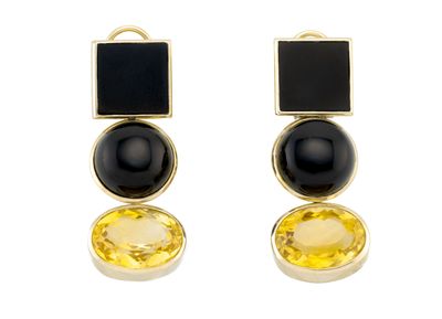 pair of earrings with black and yellow stones on a white background