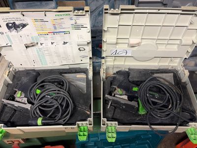 two boxes with wires in them sitting on the floor