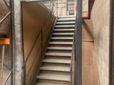 a staircase going up to the top of a building