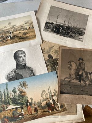 many old photos of men and horses on the table