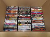 a lot of dvds in a box on the table