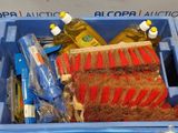 a blue bin with cleaning supplies inside of it