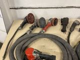 a lot of hoses that are sitting on a table