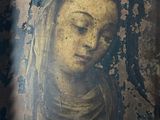 an old painting of a woman with a veil on it ' s head