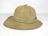 an image of a tan hat with a bow on the top of it