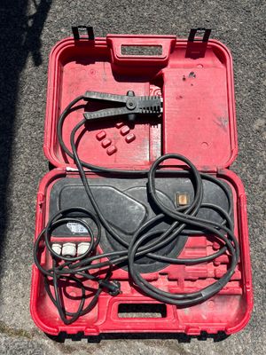 a red tool case with wires and wires in it