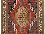 un tapis rouge et bleu à motifs géométriques
